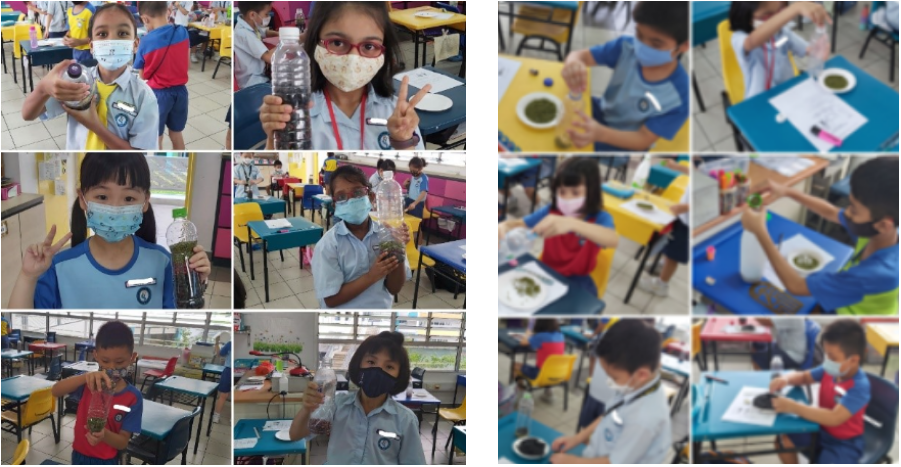 Young masked students in a classroom hold bottles and small containers during a science activity.